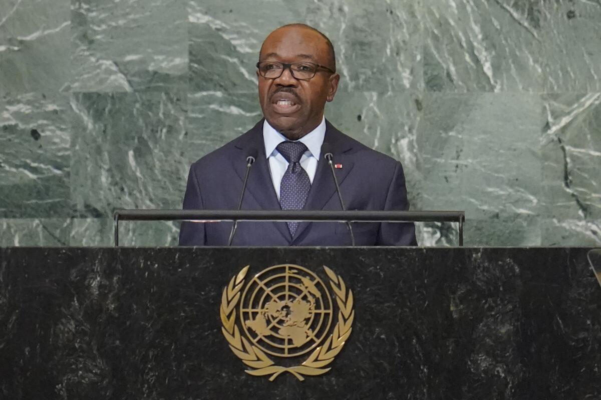 Gabonese President Ali Bongo Ondimba speaks at a lectern with the U.N. seal