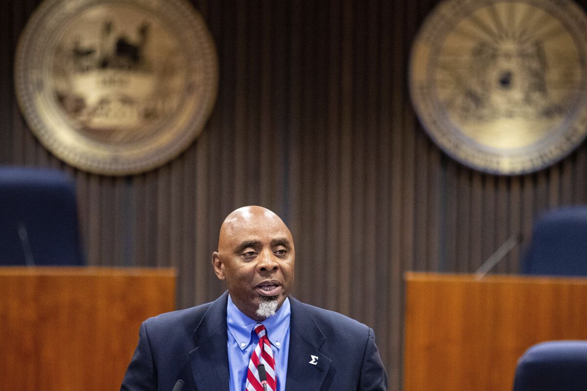 Special prosecutor Fred Franklin announces charges in the shooting death of James Scurlock during a press conference at the Omaha city council legislative chambers on Tuesday, Sept. 15, 2020, in Omaha, Neb. (Chris Machian/Omaha World-Herald via AP)