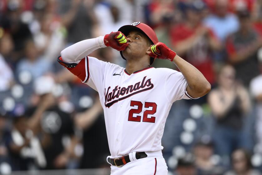 FILE - Washington Nationals' Juan Soto celebrates his home run during the eighth inning of a baseball game against the Atlanta Braves, on July 17, 2022, in Washington. The San Diego Padres acquired superstar outfielder Juan Soto from the Nationals on Tuesday, Aug. 2, 2022, in one of baseball's biggest deals at the trade deadline, vaulting their postseason chances by adding one of the game's best young hitters. (AP Photo/Nick Wass, FIle)
