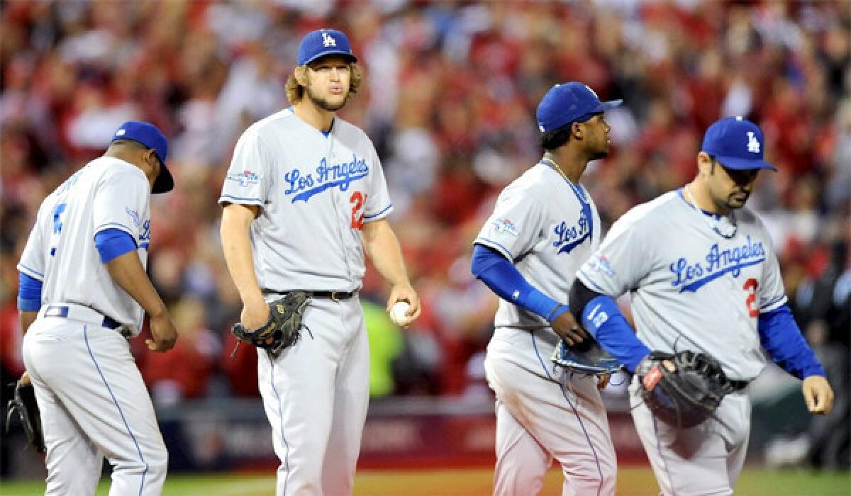 Clayton Kershaw looks to the stands after giving up four runs to the St. Louis Cardinals in the third inning in Game 6 of the National League Championship Series .