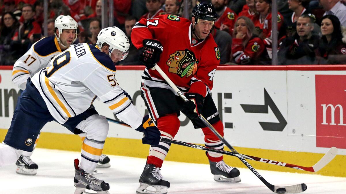 Defenseman Rob Scuderi will go from one playoff contender, the Blackhawks, to the Kings, whom he helped win the Stanley Cup in 2012.