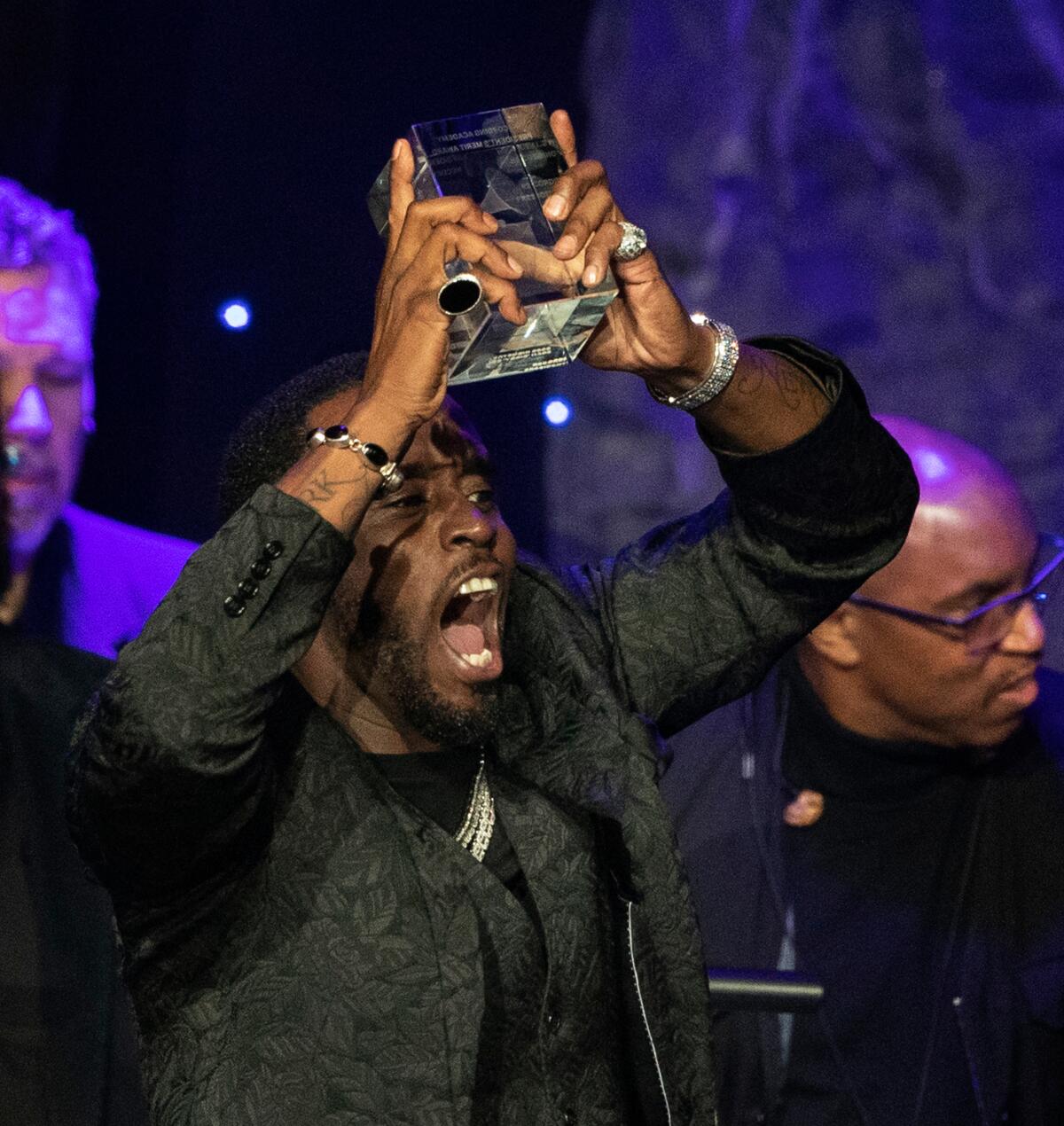 Sean "Diddy" Combs accepts the Industry Icon award at Clive Davis' annual pre-Grammy gala on Saturday night at the Beverly Hilton.