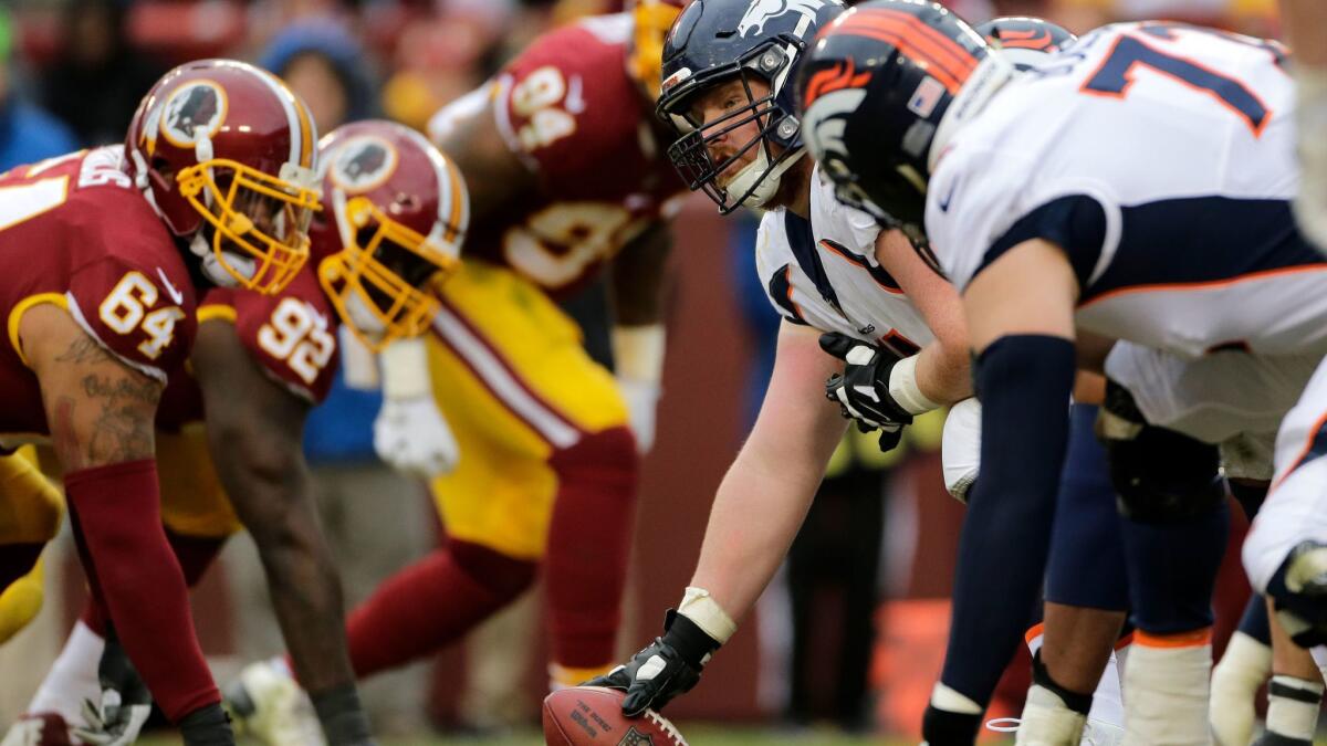 Denver Broncos center Matt Paradis prepares to snap the ball against the Washington Redskins.