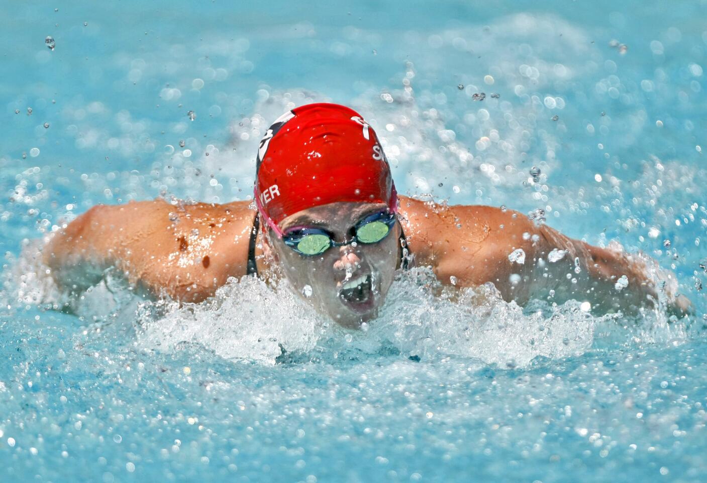 Flintridge Sacred Heart Academy's senior Katie Altmayer wins the girls varsity 100 yard butterfly race in the 2014 Mission League Championship Meet at the Rose Bowl Aquatic Center in Pasadena on Tuesday, April 29, 2014.