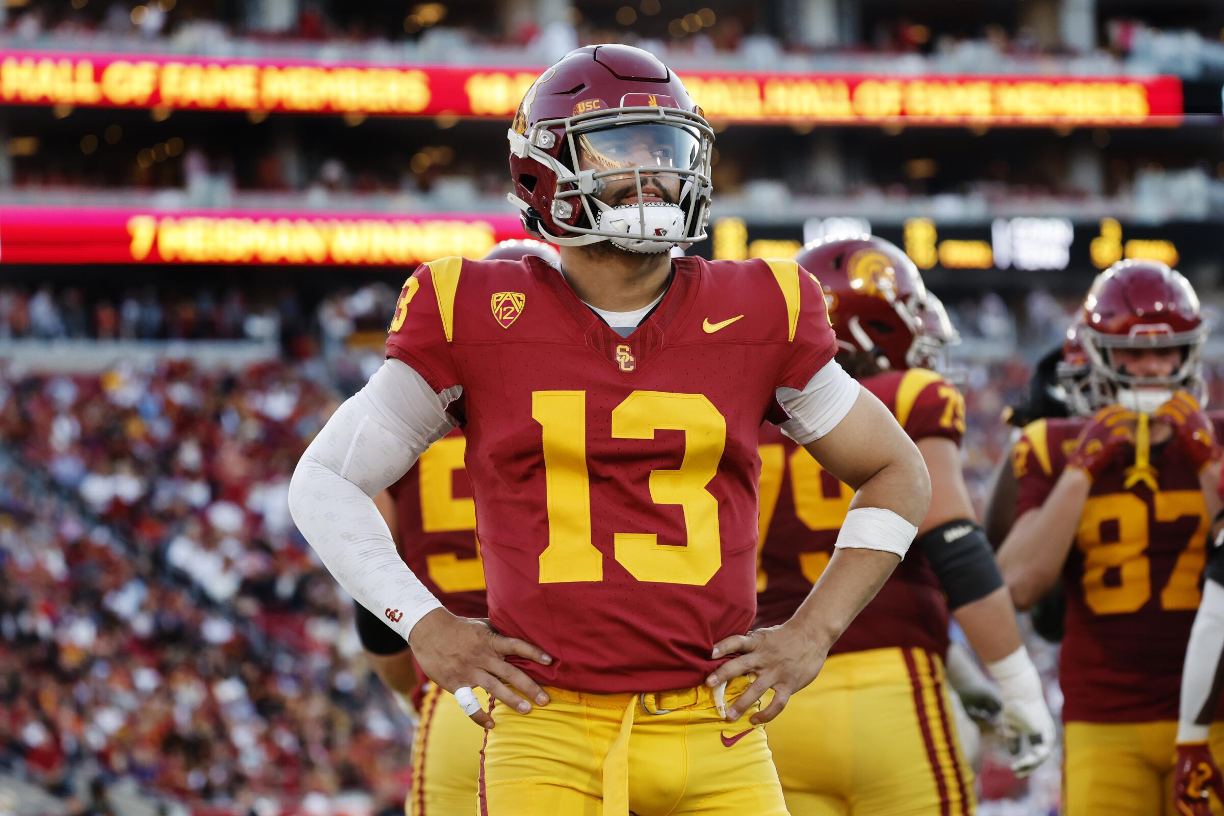 USC quarterback Caleb Williams stands on the sideline during a loss to Washington at the Coliseum on Nov. 4.