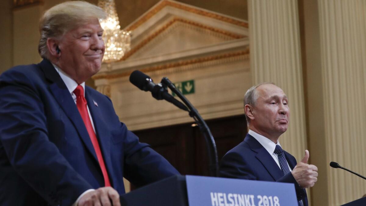 Russian President Vladimir Putin and President Trump give a joint news conference in Helsinki, Finland, on July 16.