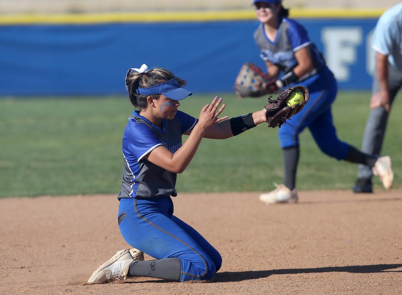 Fountain Valley's Samarta Ortega snags a line drive up the middle in a Wave League game at Newport Harbor on Wednesday.