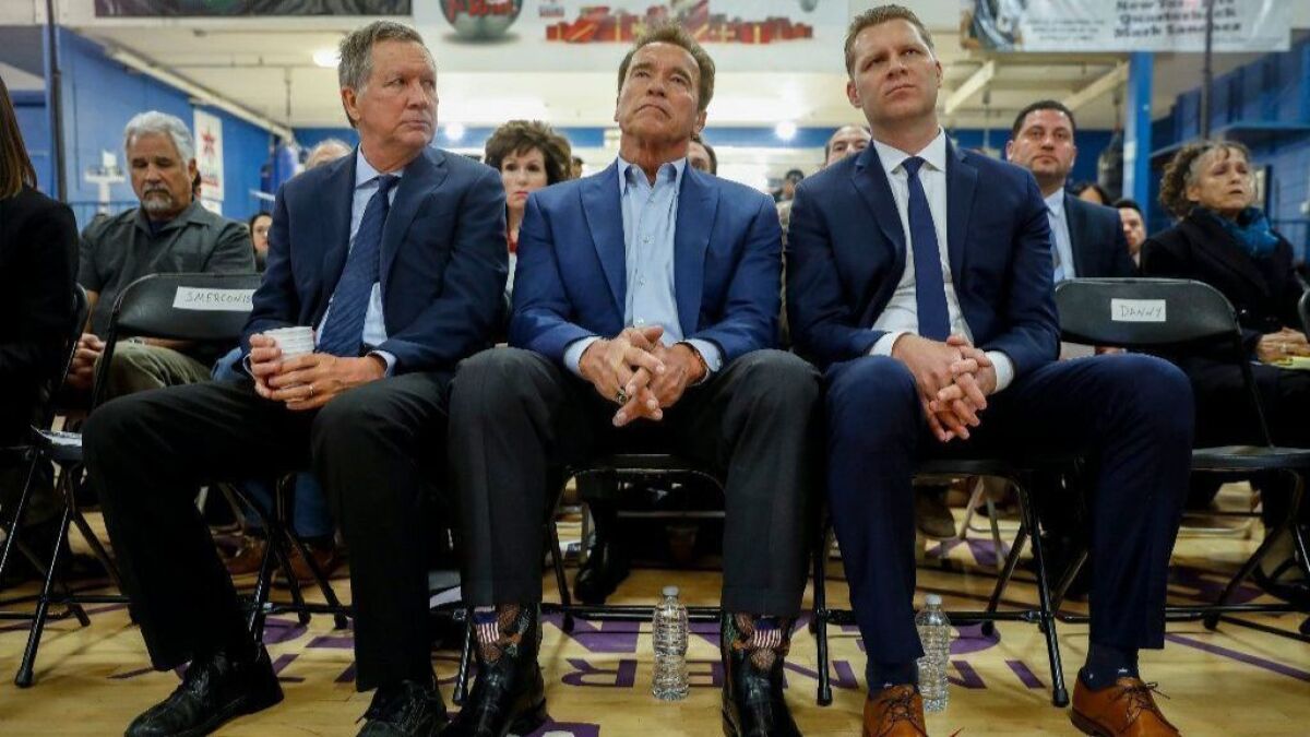 Former Gov. Arnold Schwarzenegger, center, Ohio Gov. John Kasich, left and Assemblyman Chad Mayes (R-Yucca Valley) at an event to debut a new group trying to reform the California Republican Party.