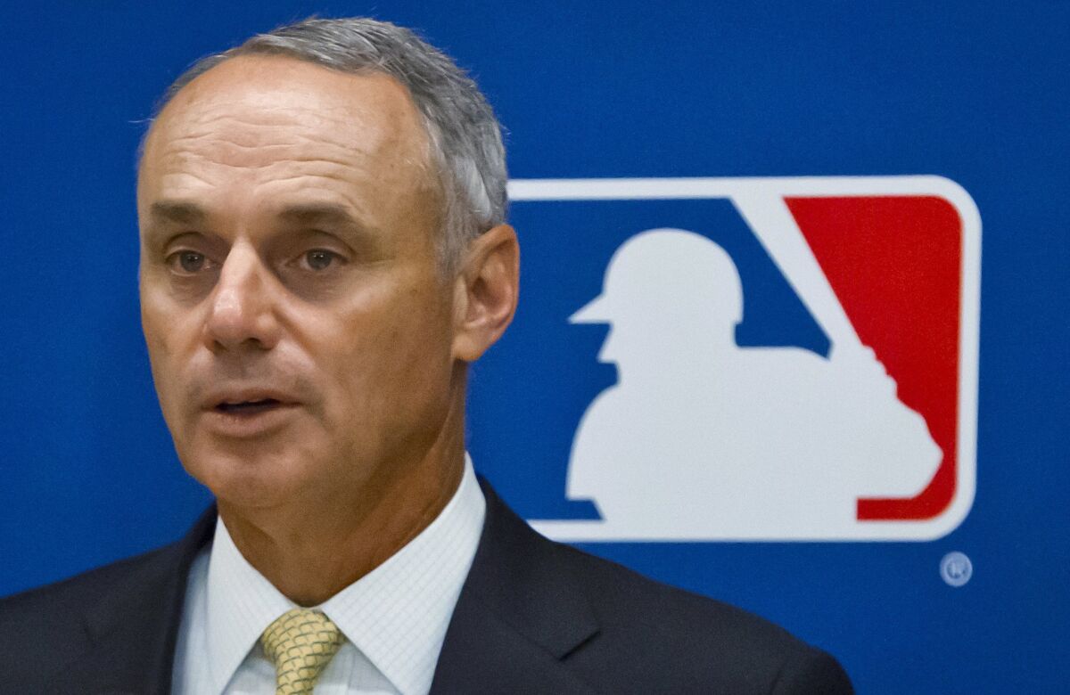 Major League Baseball Commissioner Rob Manfred speaks during a May news conference in New York.