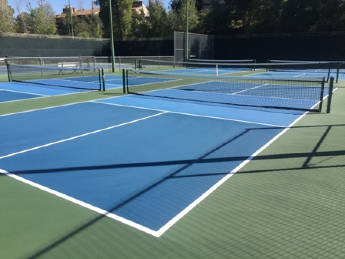 A rarity in pickleball circles — empty courts. 