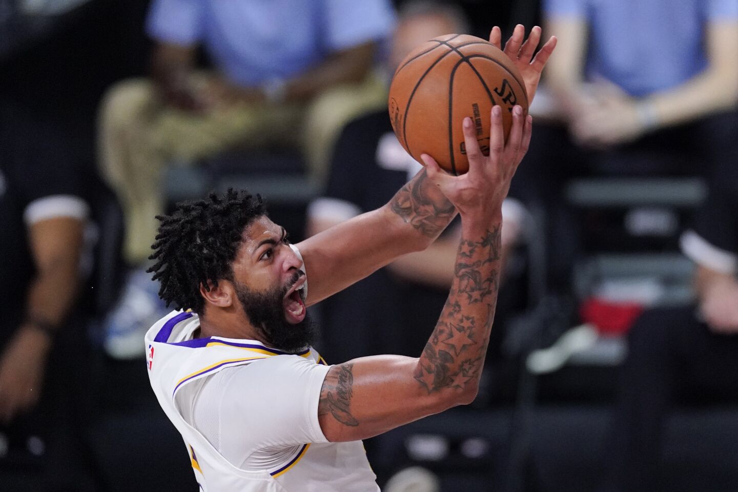 Lakers forward Anthony Davis drives to the basket during the second half Saturday.