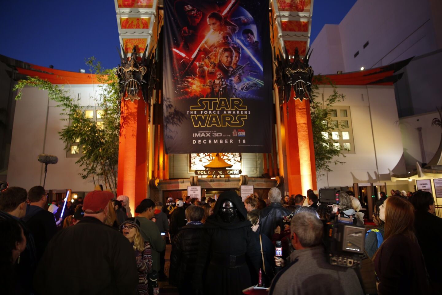 Fans line up outside the theater.