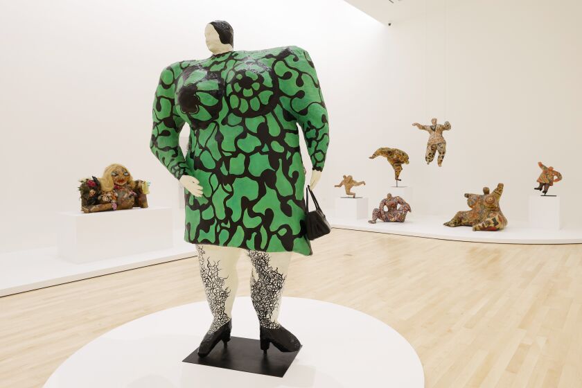 SAN DIEGO, CA - MARCH 31: The Museum of Contemporary Art San Diego in La Jolla was remodeled with an expanded 46,400 square feet of new space. Here, the Strauss West Gallery with Niki de Saint Phalle's Madame, or Green Nana with Black Bag is shown on Thursday, March 31, 2022. (K.C. Alfred / The San Diego Union-Tribune)