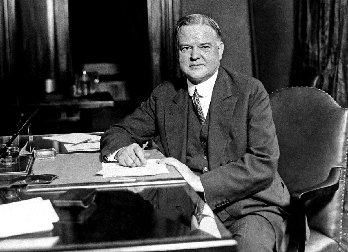 Herbert Hoover at his desk in Washington, 1928.