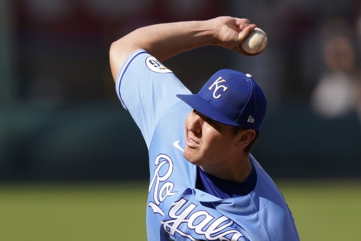 Kansas City Royals starting pitcher Brad Keller throws during the ninth inning of a baseball game against the Pittsburgh Pirates Sunday, Sept. 13, 2020, in Kansas City, Mo. Keller pitched a complete game and shut out the Pirates. (AP Photo/Charlie Riedel)