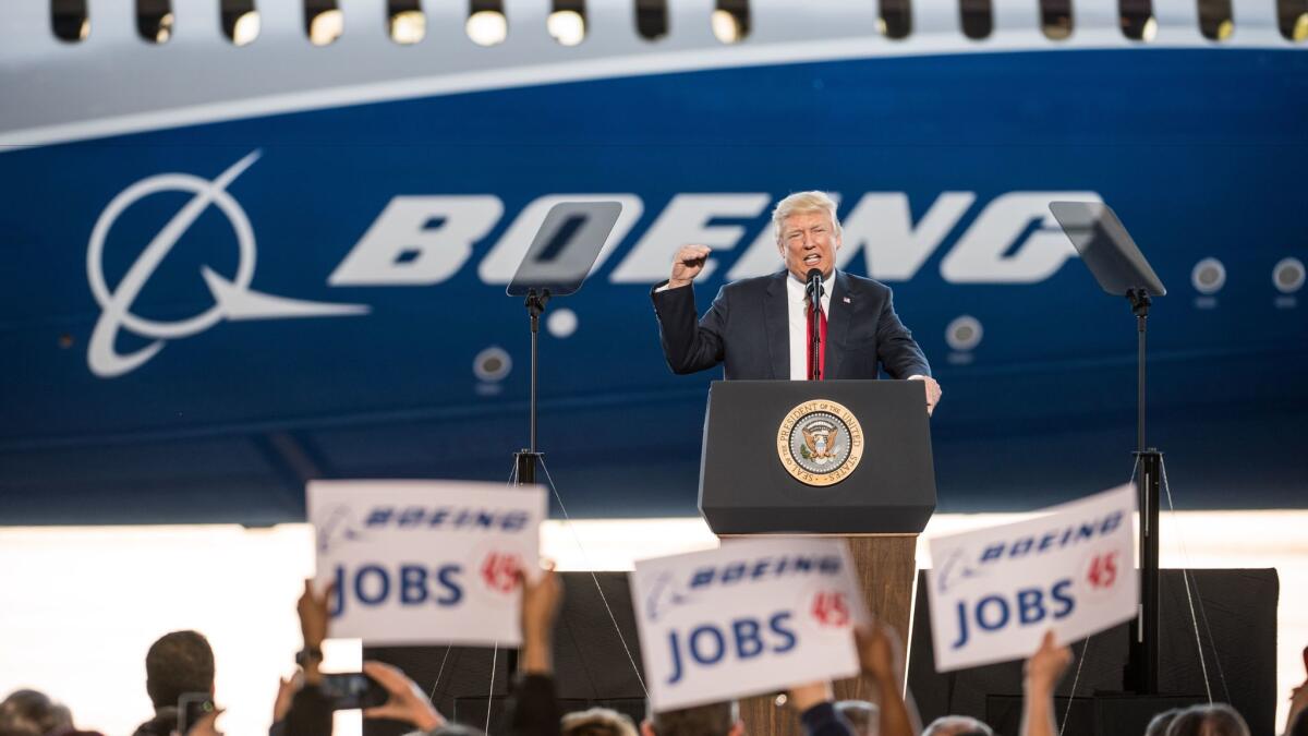 President Trump addresses a crowd at Boeing Co.'s North Charleston, S.C., factory. (Sean Rayford / Getty Images)