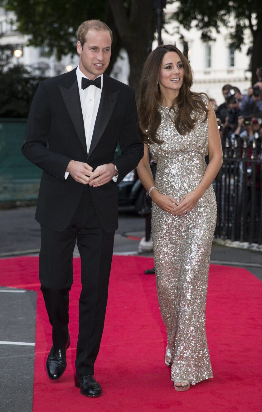 Britain's Prince William and his wife, Catherine, Duchess of Cambridge, arrive at the inaugural Tusk Conservation Awards at the Royal Society in London on Thursday.