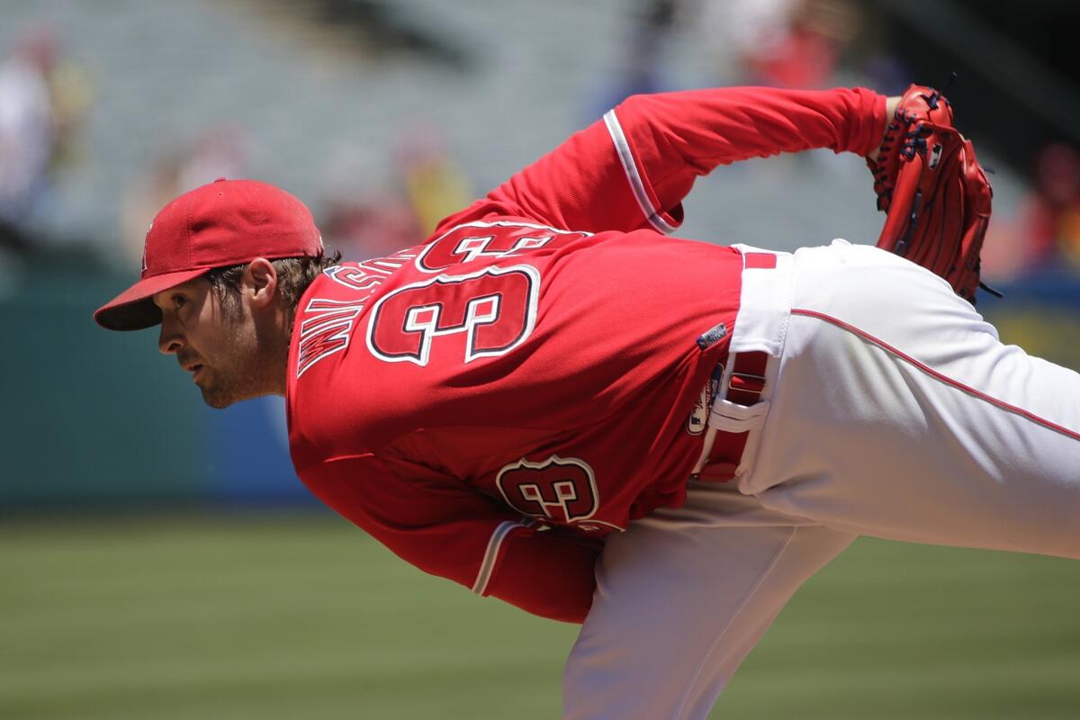 C.J. Wilson throws during the first inning of a game Wednesday against the Toronto Blue Jays. Wilson lasted just 3 2/3 innings before being charged for three earned runs on eight hits.