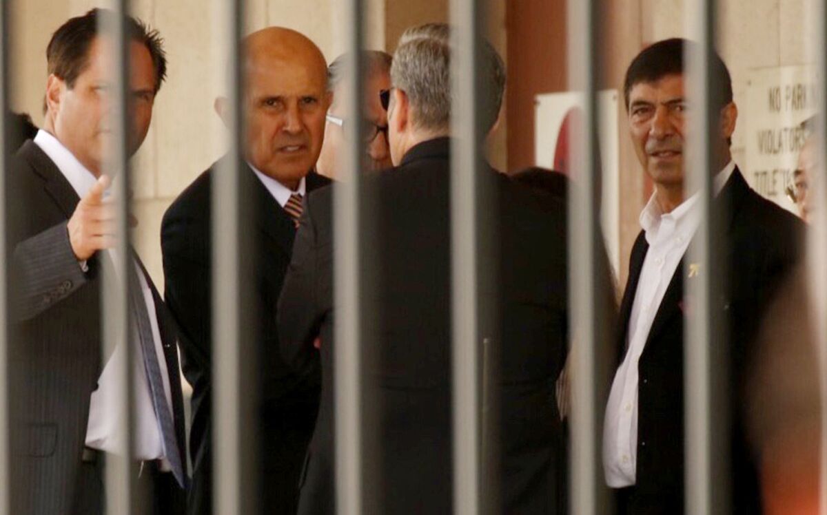 Former Los Angeles County Sheriff Lee Baca leaves federal court via a loading dock Monday.