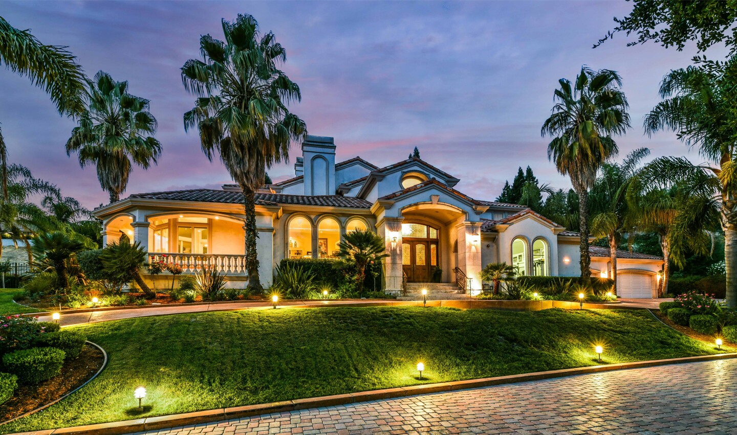 Built in 2002, the palatial home holds seven bedrooms, eight bathrooms, an indoor spa, sauna, movie theater and gym in more than 10,000 square feet.