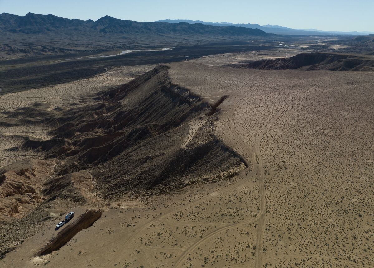 A river appears below a mesa.