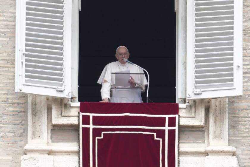 Pope Francis delivers his message from his studio window overlooking St. Peter's Square during the Regina Coeli prayer at the Vatican, Sunday, May 1, 2022. (AP Photo/Gregorio Borgia)