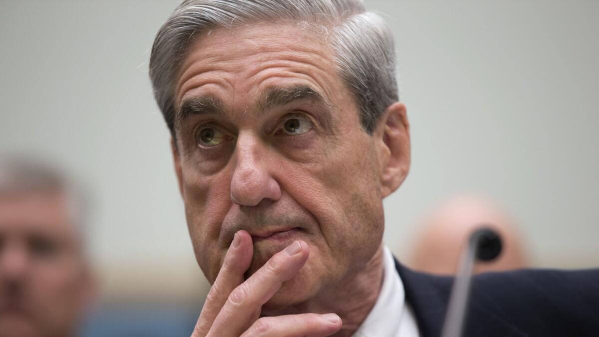 Special counsel Robert Mueller III, pictured here testifying on Capitol Hill in 2013 when he was FBI director, is awaiting President Trump's written answers to questions in the Russia investigation.