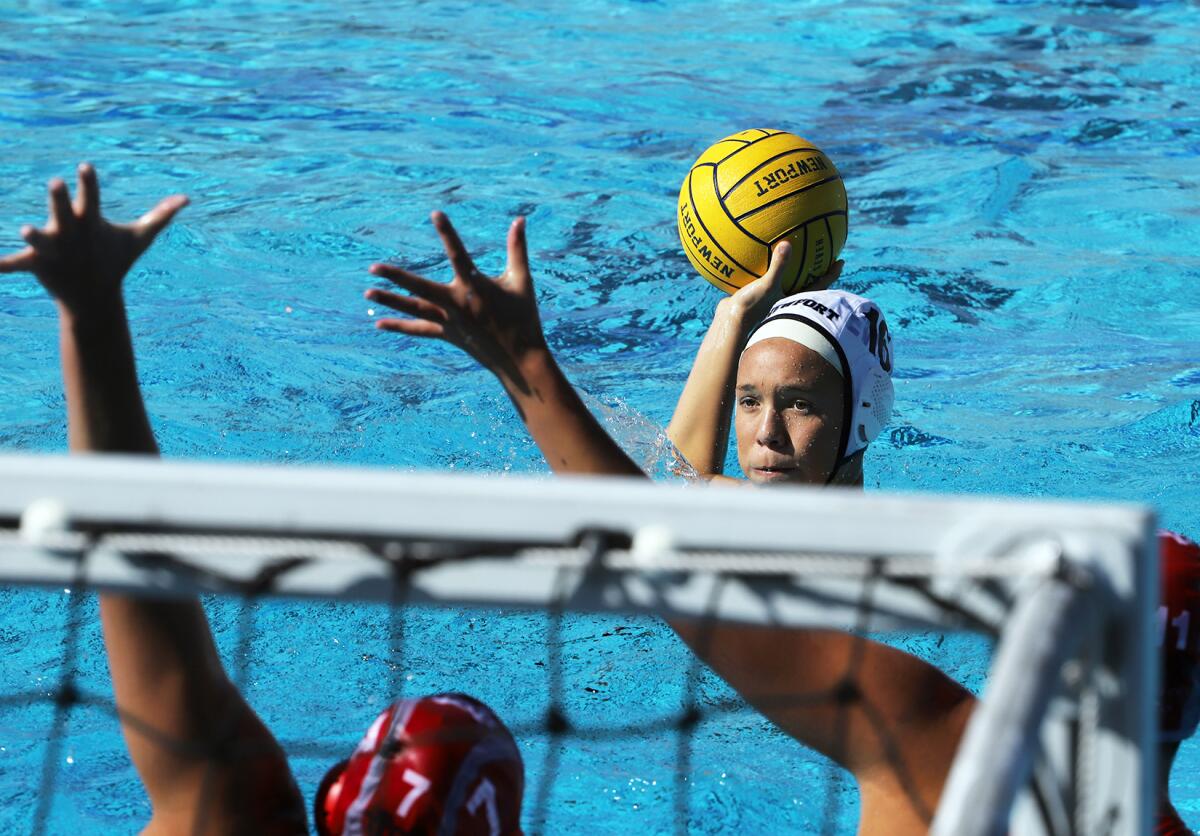 Newport Harbor's Sophia Verdugo (16) shoots to the goal against Mater Dei on Saturday.