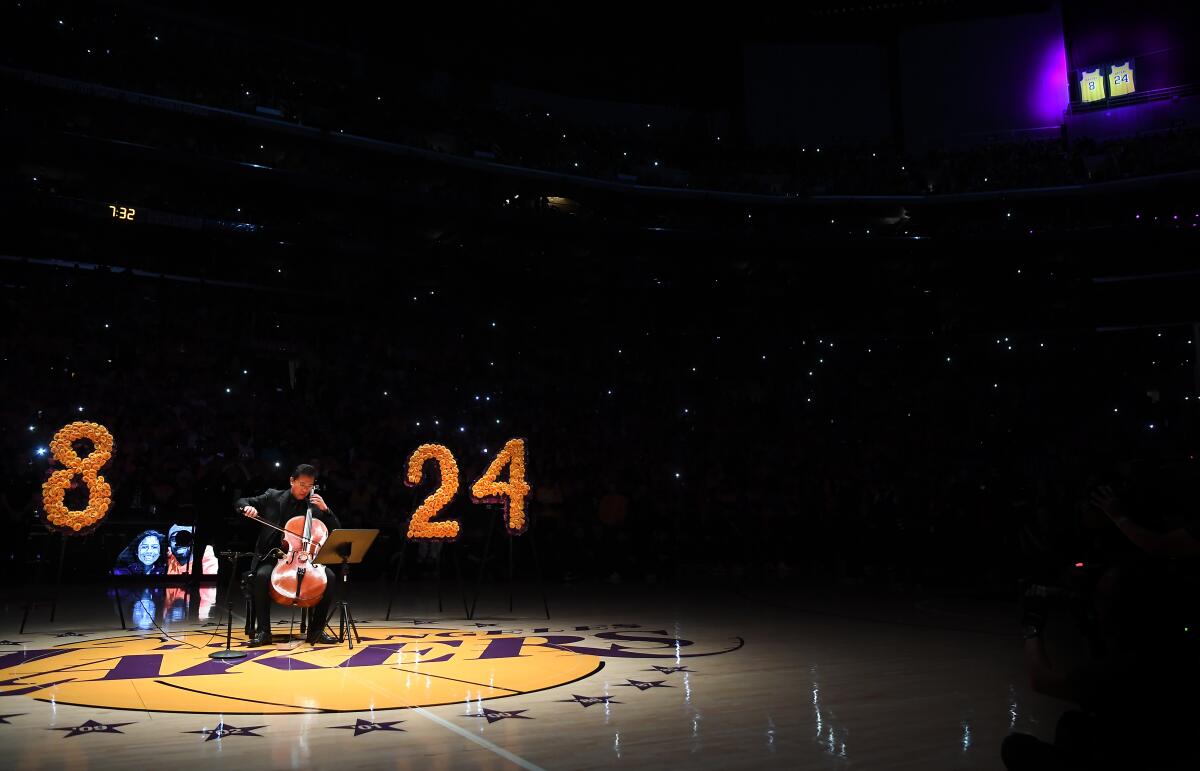 Ben Hong plays the cello during the pregame ceremony honoring Kobe Bryant at Staples Center on Jan. 31.
