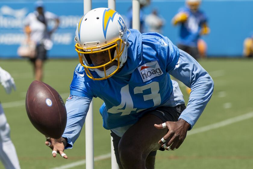 Los Angeles Chargers corner back Michael Davis takes part in drills at the NFL football team's practice facility in Costa Mesa, Calif., Wednesday, June 1, 2022. (AP Photo/Alex Gallardo)