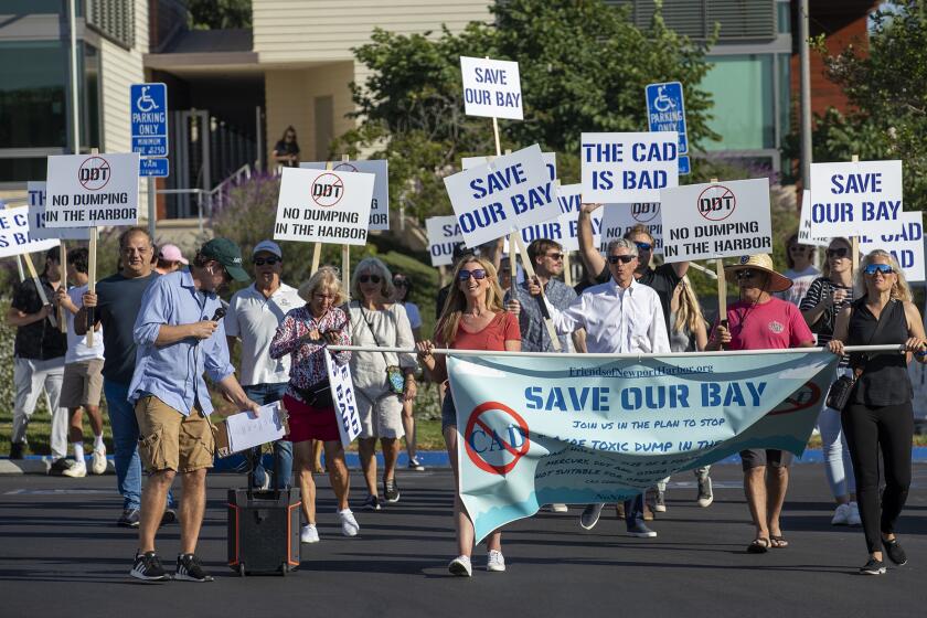 Newport Beach, CA - September 27: Friends of Newport Harbor walk to Newport Beach City Hall to protest a proposed dump site in Newport Bay on Tuesday, Sept. 27, 2022 in Newport Beach, CA. (Scott Smeltzer / Daily Pilot)