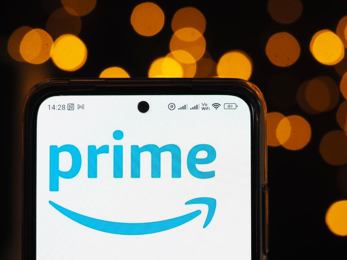 The Amazon Prime logo is displayed on a smartphone screen. 
