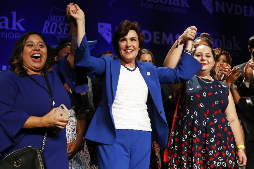 Rep. Jacky Rosen, D-Nev., center, celebrates at a Democratic election night party after winning a Senate seat Wednesday, Nov. 7, 2018, in Las Vegas. A female political movement driven by backlash to President Donald Trump kicked off 2018 by hosting a women's march in Nevada and 11 months later, that activism helped women win key races across the state, including ousting an incumbent U.S. Senator, electing a female-majority federal delegation and a female-majority state Assembly. (AP Photo/John Locher)