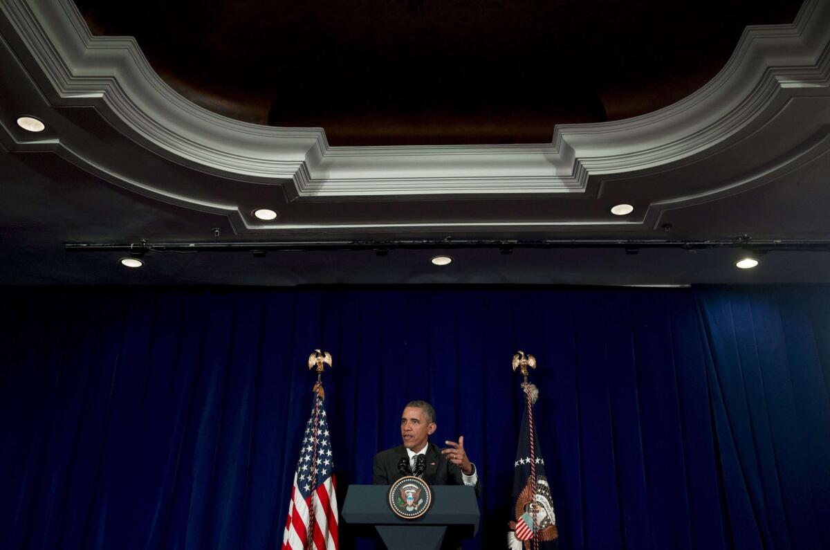 President Obama holds a news conference in Kuala Lumpur after taking part in the ASEAN Summit.