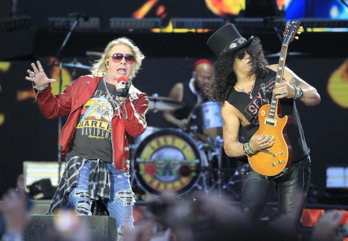Guns N' Roses' Axl Rose, left, and Slash