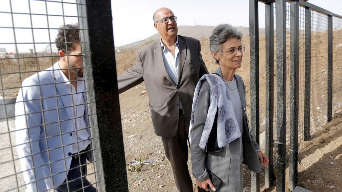 Marianne Gasser, head of the International Committee of the Red Cross delegation in Syria, passes through the Quneitra border crossing between Syria and the Israeli-occupied Golan Heights after it was reopened on Oct. 15, 2018.