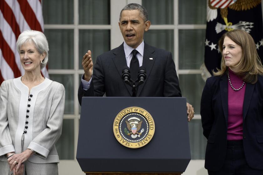 President Obama is shown in April, flanked by outgoing Health and Human Services Secretary Kathleen Sebelius, left, and Sylvia Mathews Burwell, who was confirmed June 5 to replace Sebelius.