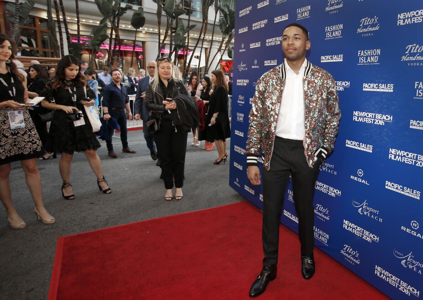 Actor Kelvin Harrison Jr., who stars in the movie “Luce,” about a former child soldier from Eritrea who is adopted by white parents and naturalized in America, walks the red carpet on opening night of the 2019 Newport Beach Film Festival on Thursday.