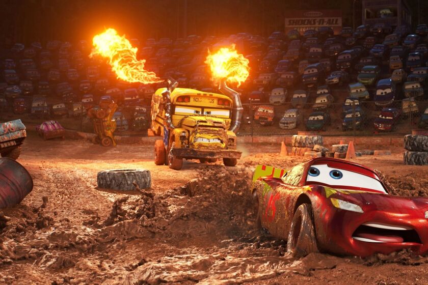 This image released by Disney shows Lightning McQueen, voiced by Owen Wilson, foreground, in a scene from "Cars 3." (Disney-Pixar via AP)