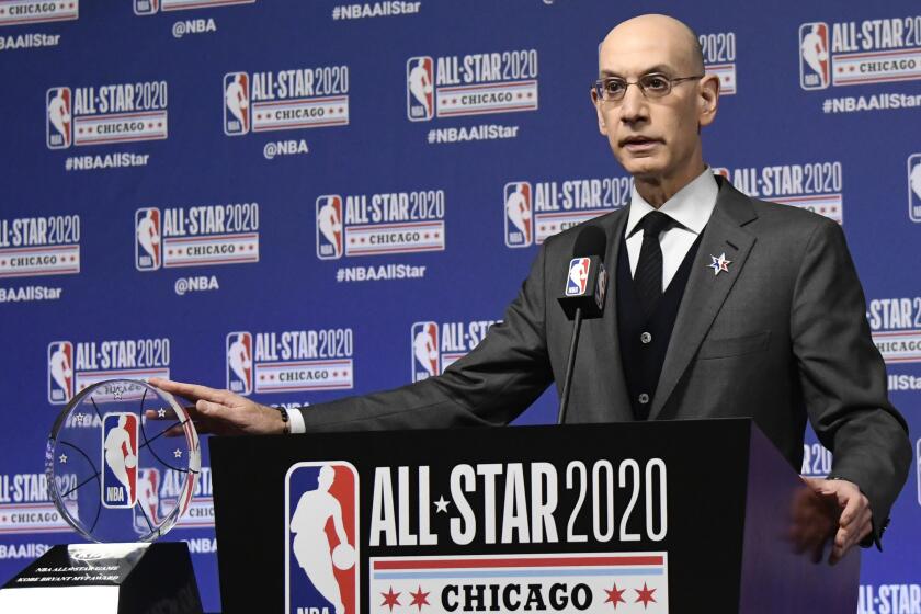 NBA Commissioner Adam Silver unveils the NBA All-Star Game Kobe Bryant MVP Award during a news conference Saturday, Feb. 15, 2020, in Chicago. (AP Photo/David Banks)