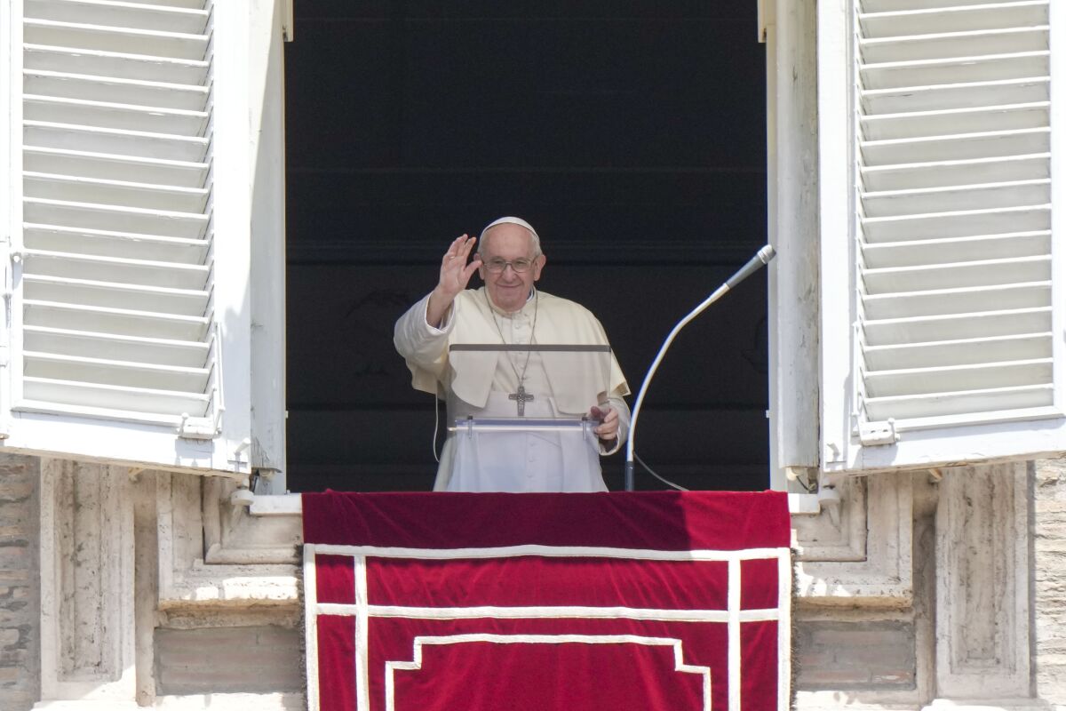 Pope Francis recites the Angelus noon prayer from the window of his studio overlooking St.Peter's Square, at the Vatican, Sunday, July 3, 2022. (AP Photo/Andrew Medichini)