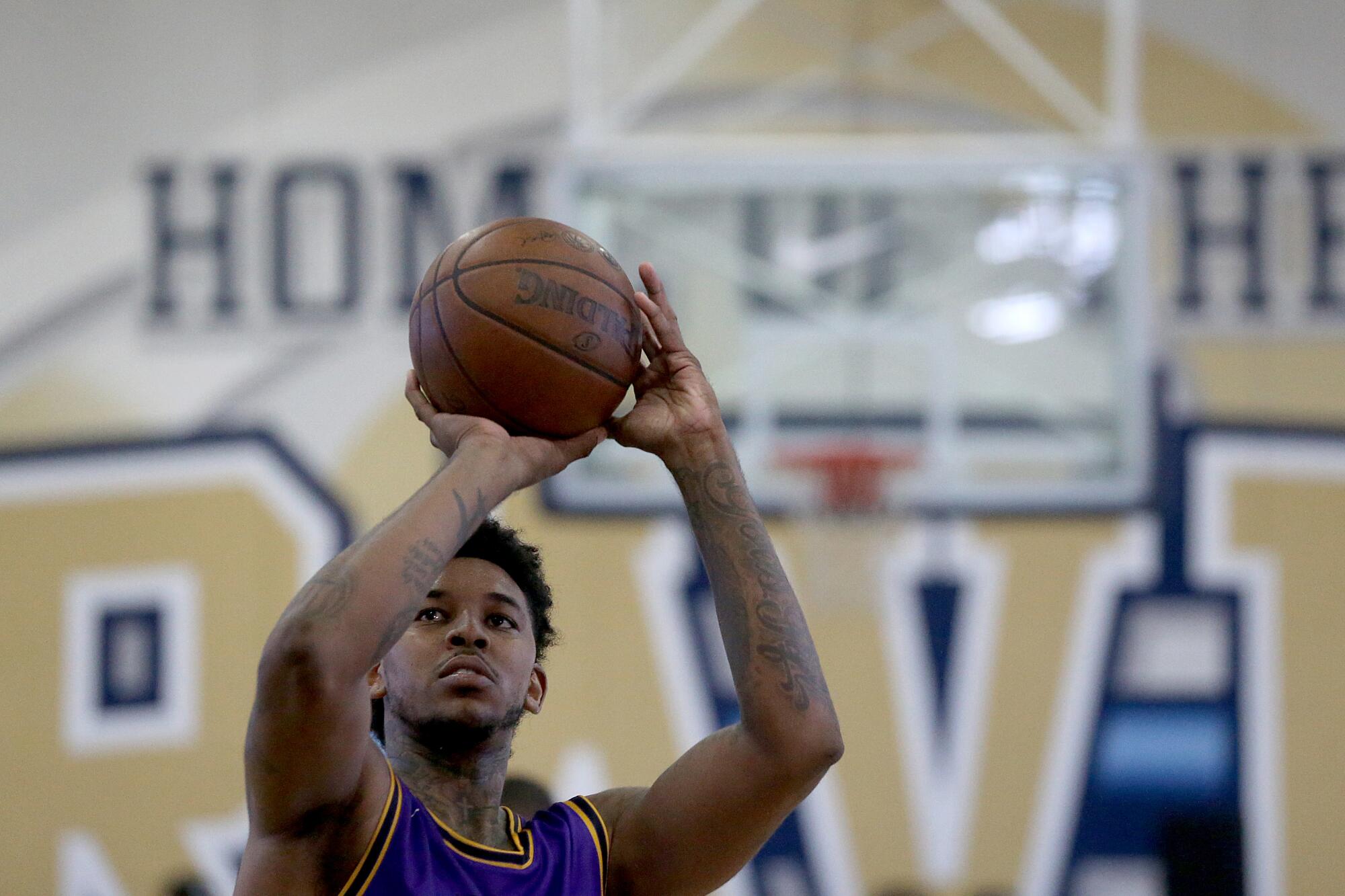 Former NBA player Nick Young shoots free throws for The Most Hated Players during a Drew League game June 26, 2021.