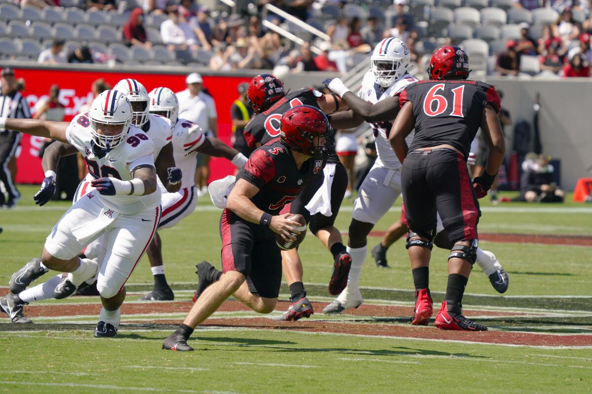 Arizona had San Diego State quarterback Braxton Burmeister on the run much of the afternoon in the 2022 season opener.