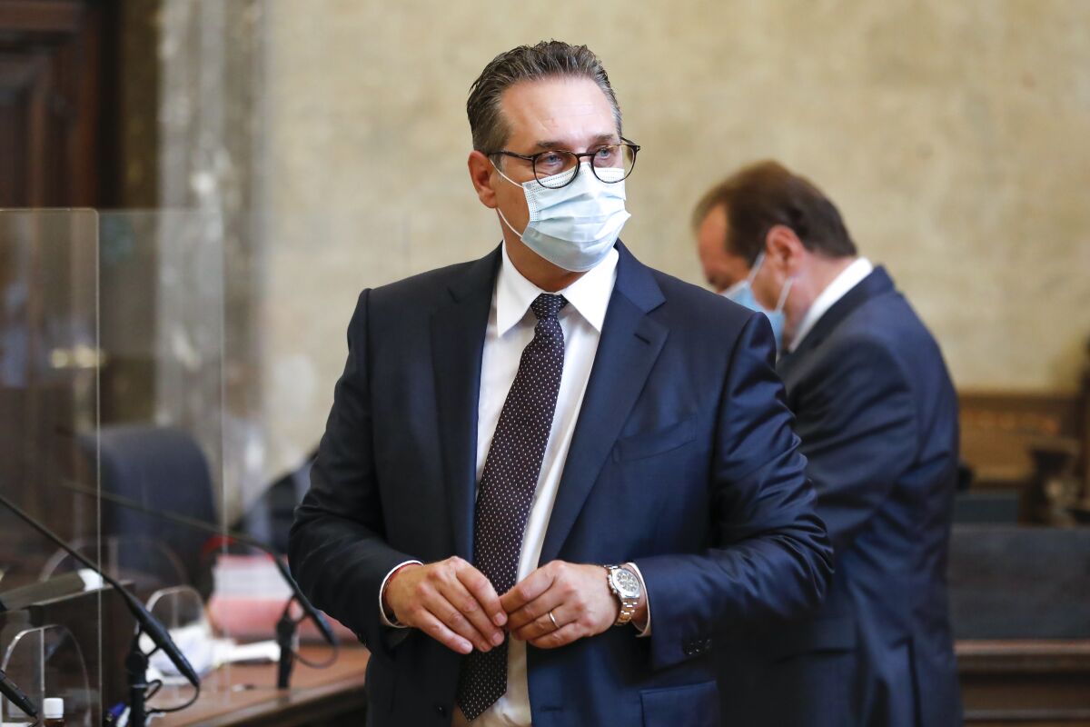 Former Freedom Party from leader Heinz-Christian Strache waits for the start of a trial in a courtroom in Vienna, Austria, Tuesday, July 6, 2021. Strache is accused of trying to change laws in order to favour a private hospital in exchange for donations. (AP Photo/Lisa Leutner)