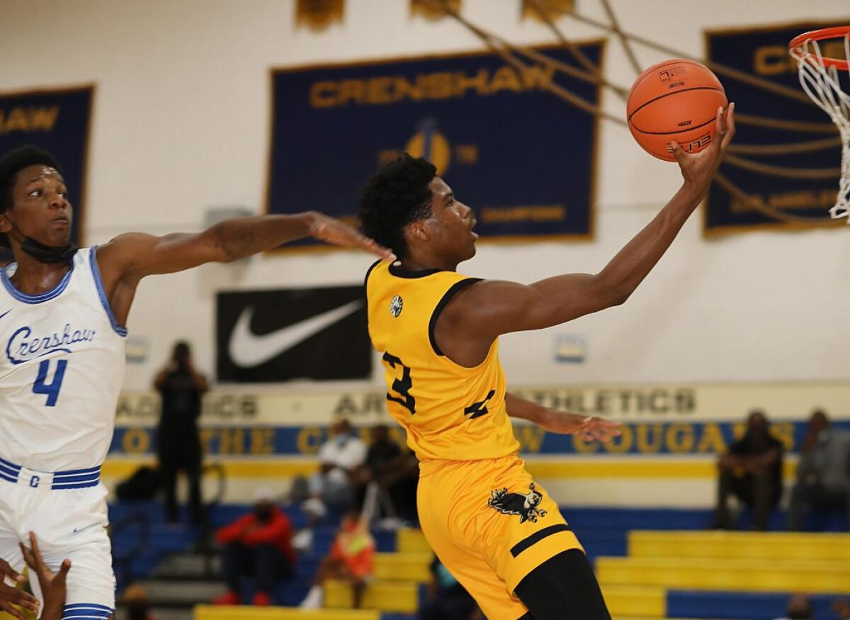 Kosy Akametu of King/Drew goes for a layup against Crenshaw on May 21, 2021. He finished with 30 points.