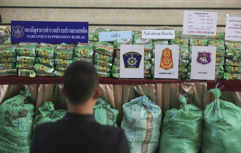 FILE -Reporters view packages of methamphetamines on a table during a press conference at Narcotics Suppression Bureau Bangkok, Thailand, Monday, July 15, 2019. Police in the Southeast Asian nation of Laos have made their second huge seizure in three months of methamphetamine, a development that a U.N. expert on the illicit drug trade said Saturday, Jan. 29, 2022, reflects a breakdown of security in the region. (AP Photo, File)