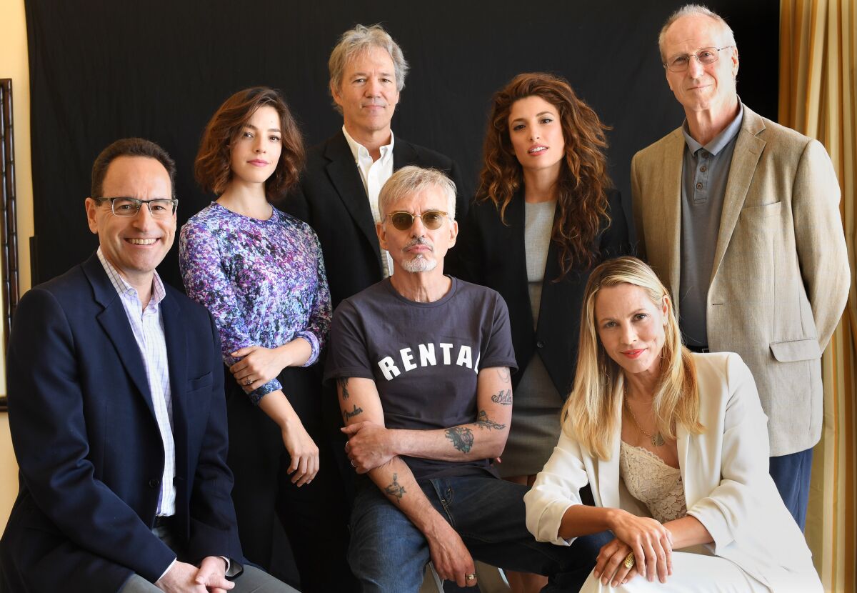 The cast and creators of Amazon's legal drama "Goliath," from left, Jonathan Shapiro, Olivia Thirlby, David E. Kelley, Billy Bob Thornton, Tania Raymonde, Maria Bello and William Hurt.