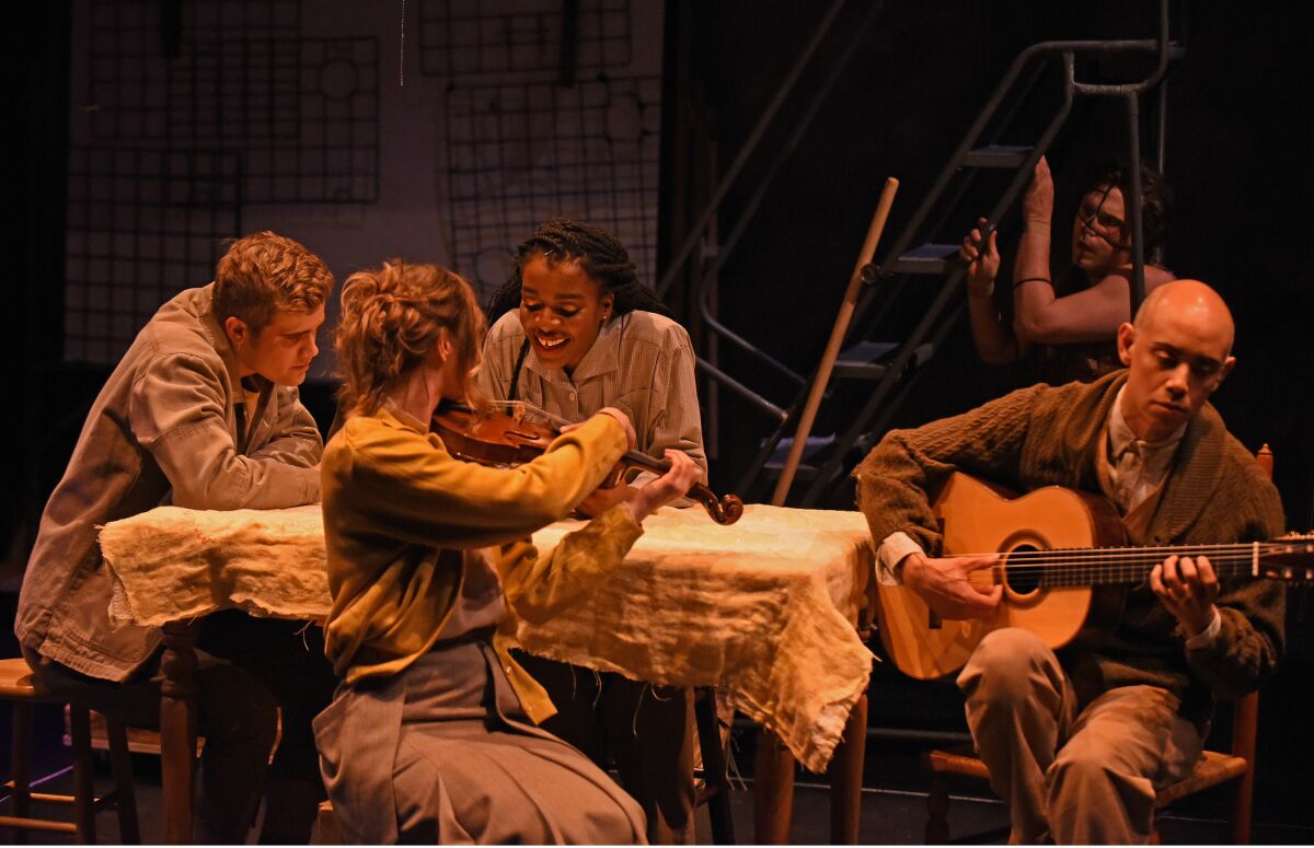 "Frankenstein" actors double as musicians and embed themselves in the scenes. From left, Lukas Papenfusscline, Yvette Holzwarth, Katherine Washington and Philip Graulty (DeLacey). 
