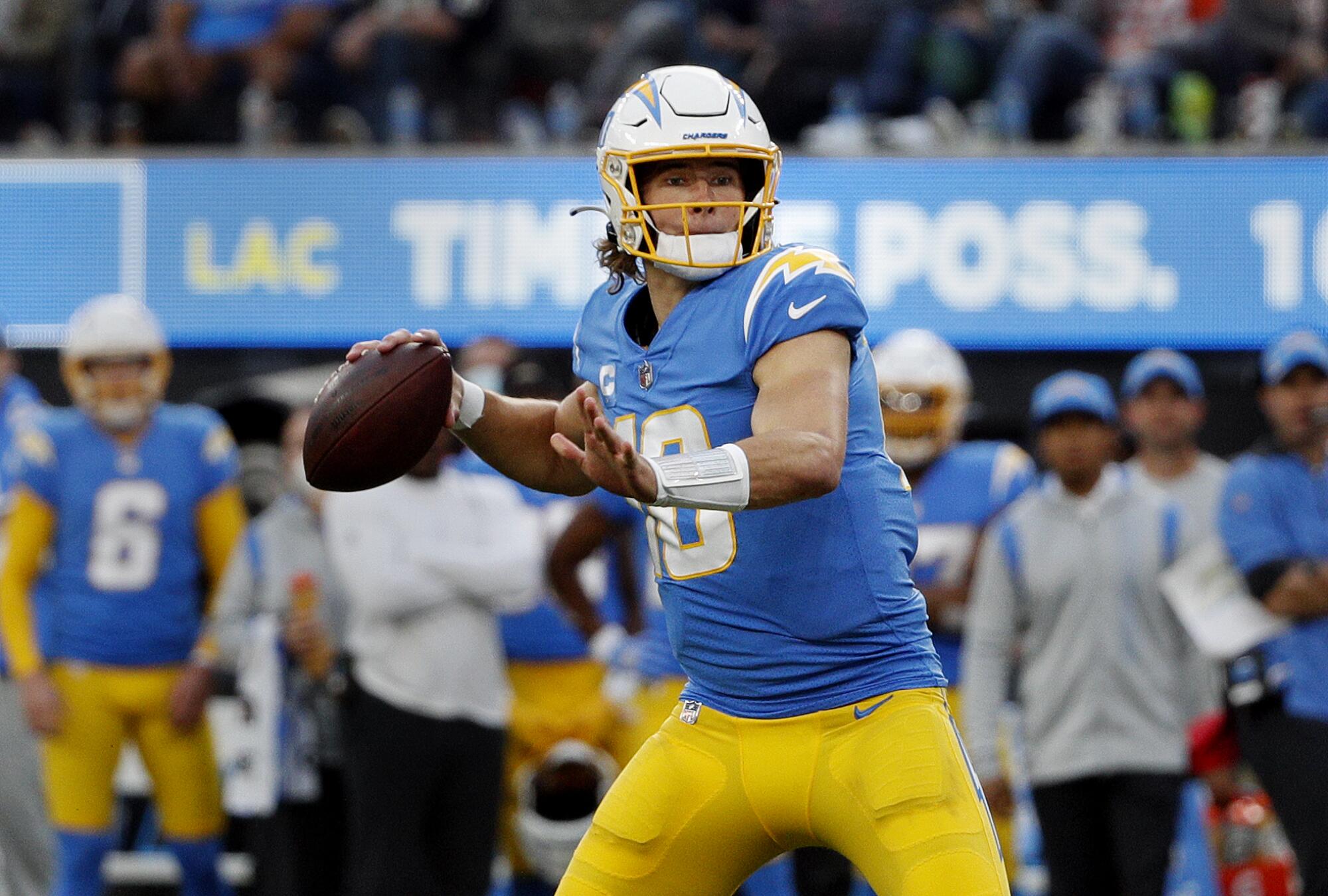 Chargers quarterback Justin Herbert prepares to pass from the pocket.