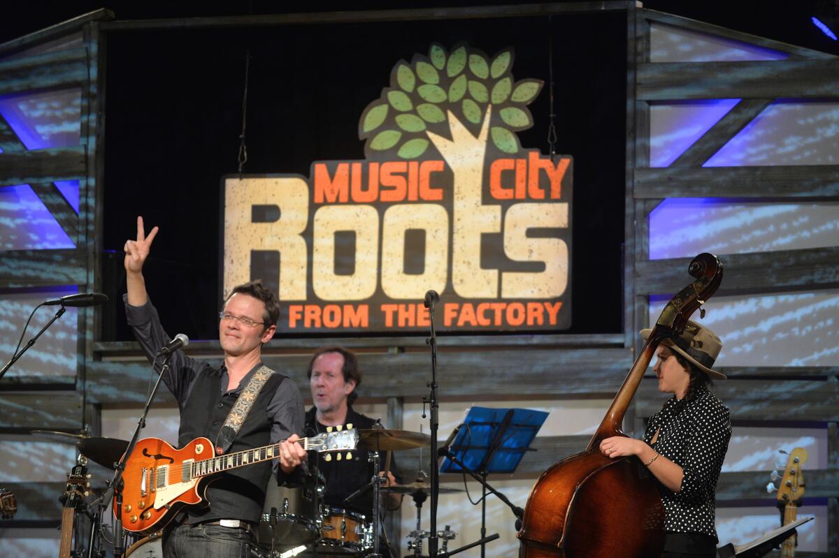 Luther Dickinson, center, performs during the Music City Root's Tribute to Sam Phillips at The Factory At Franklin in Tennessee this past February.